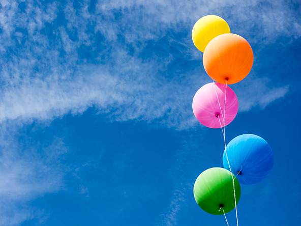 colourful balloons against blue sky